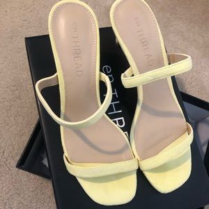 New pale yellow strappy slip-on heels